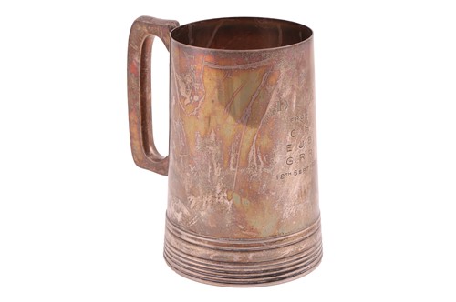Lot A silver presentation pint tankard by Walker &...