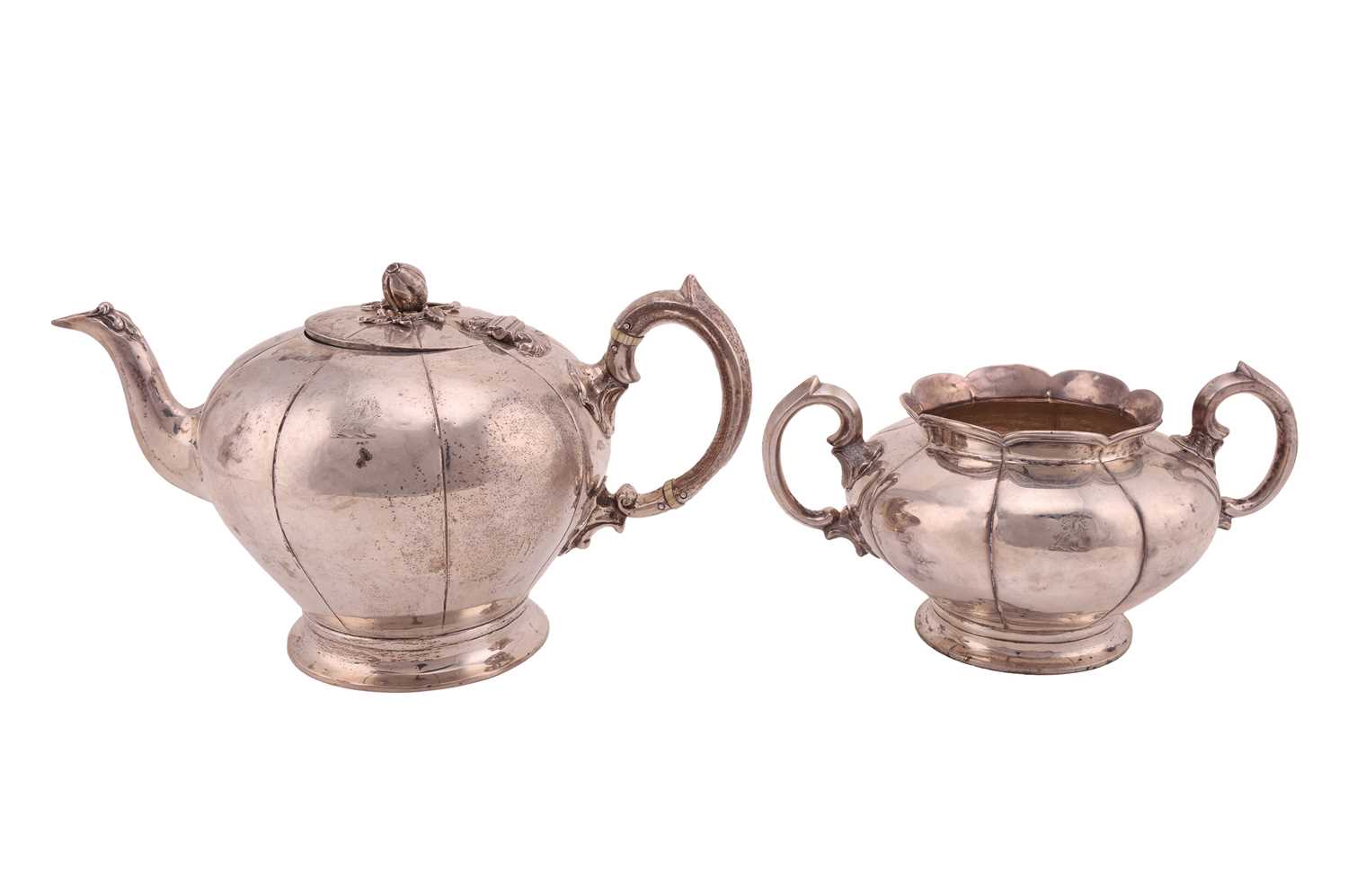 Lot A Victorian silver presentation teapot and...