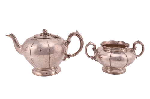 Lot A Victorian silver presentation teapot and...