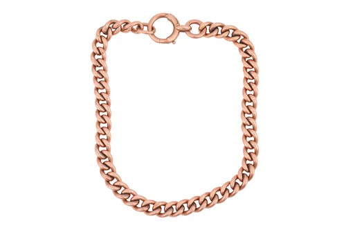 Lot A curb link bracelet in 9ct rose gold, the...