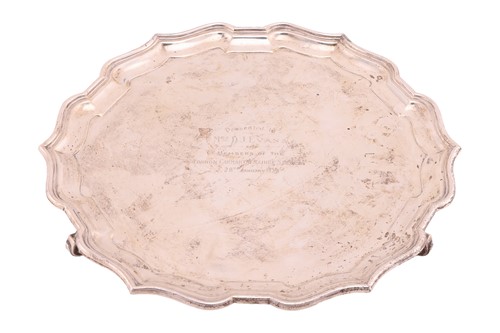 Lot A large silver presentation salver, by Adie...