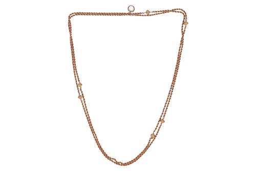 Lot 167 - A long guard chain with turquoise-set...