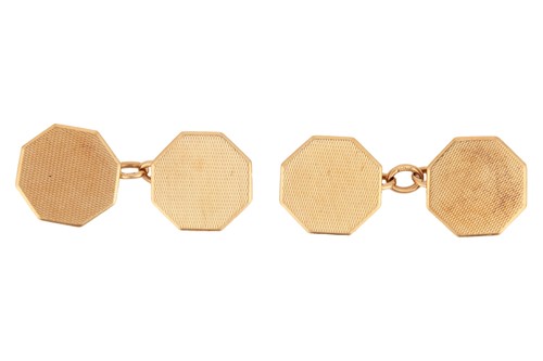 Lot 23 - A pair of hexagonal cufflinks in 9ct gold, the...