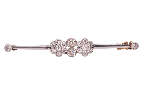 Lot An Art Deco diamond-set bar brooch, with an...