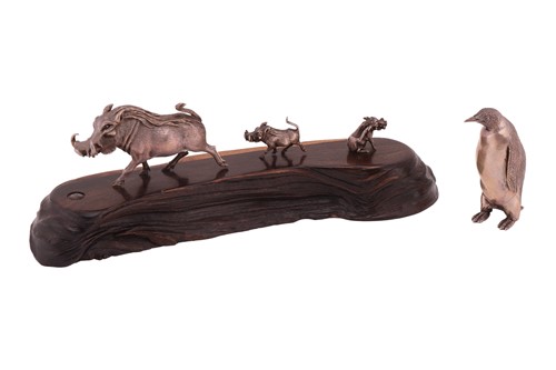 Lot 359 - Patrick Mavros - A warthog and two piglets on...