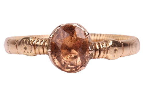 Lot A foiled-back yellow topaz dress ring, centred...