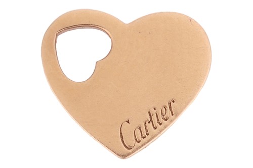 Lot 233 - Cartier - A small heart charm in 18ct yellow...