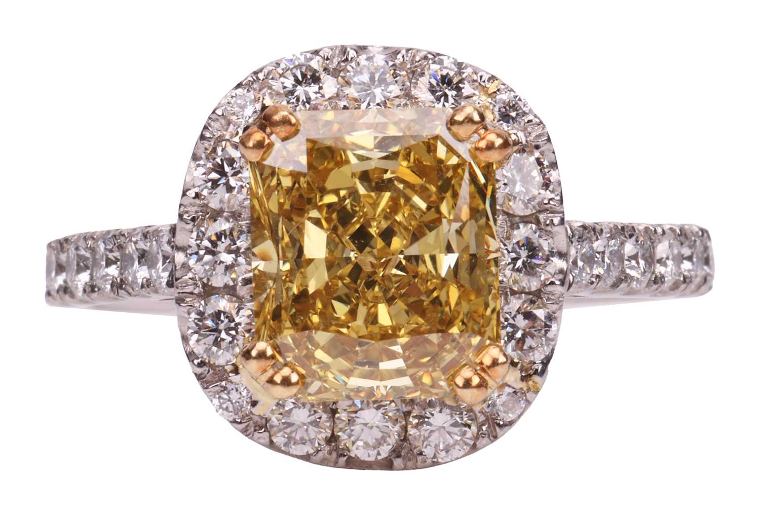 Lot A yellow diamond halo ring, the central...