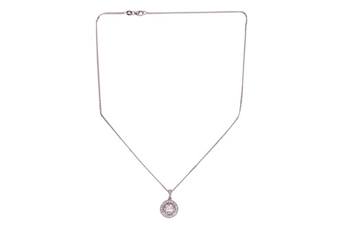 Lot An 18ct white gold diamond-set pendant on...