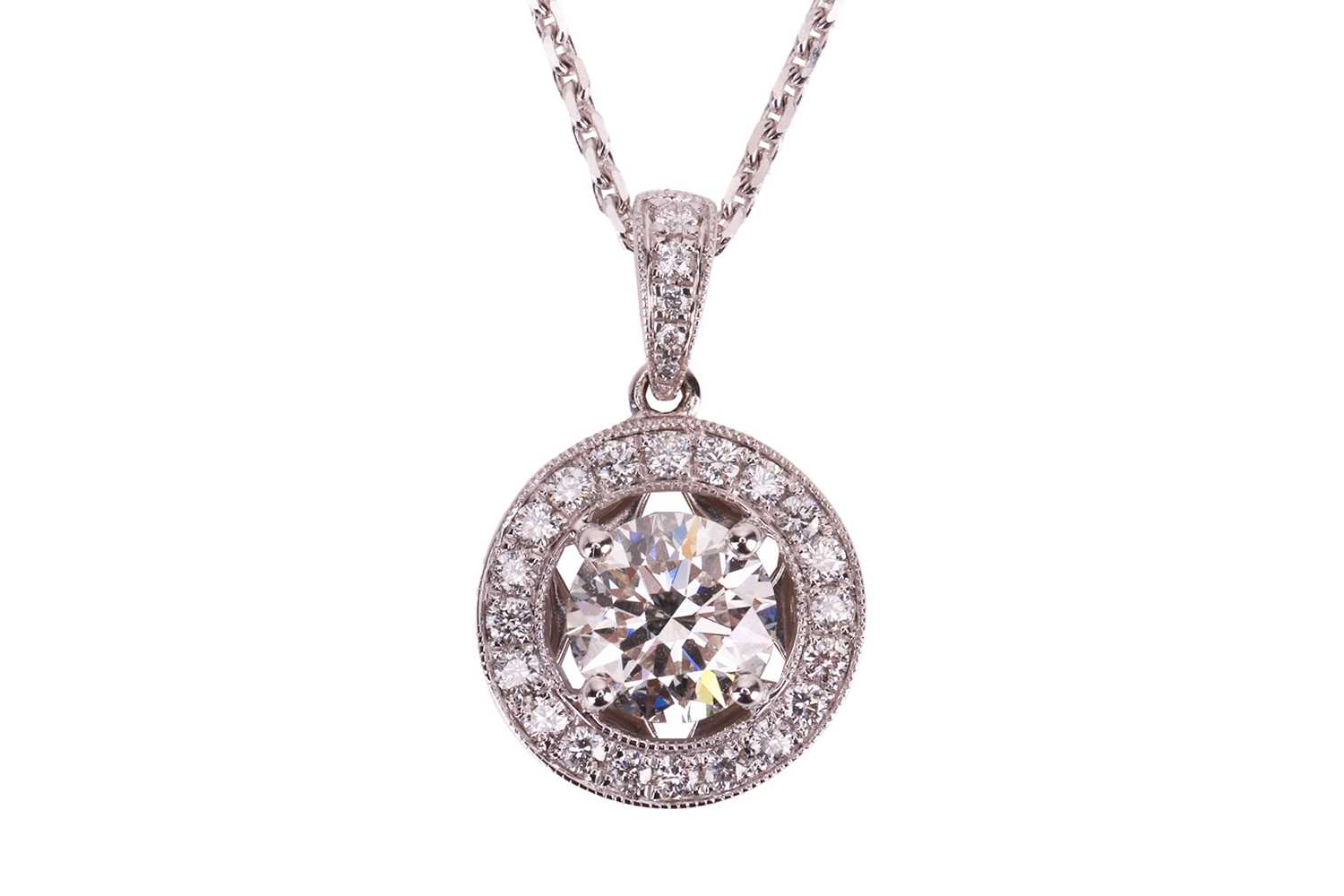 Lot An 18ct white gold diamond-set pendant on...