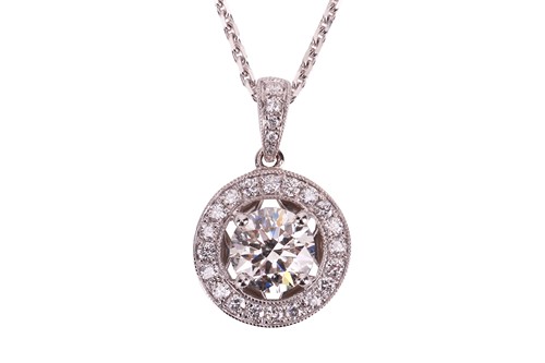 Lot An 18ct white gold diamond-set pendant on...