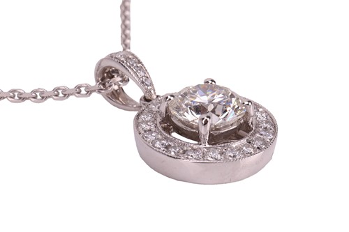 Lot An 18ct white gold diamond-set pendant on...
