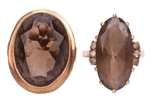 Lot 13 - An oval smoky quartz ring in 9ct gold,...