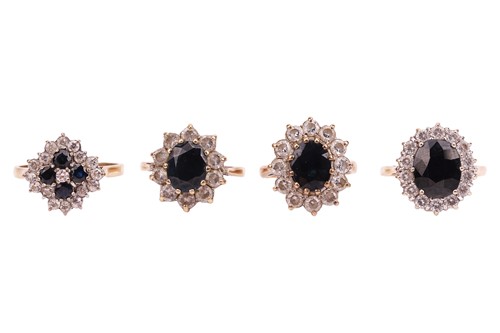 Lot 49 - A group of four sapphire and cubic zirconia...