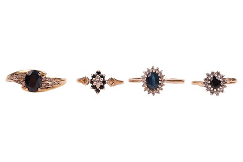 Lot 45 - Four sapphire & diamond rings, three of...
