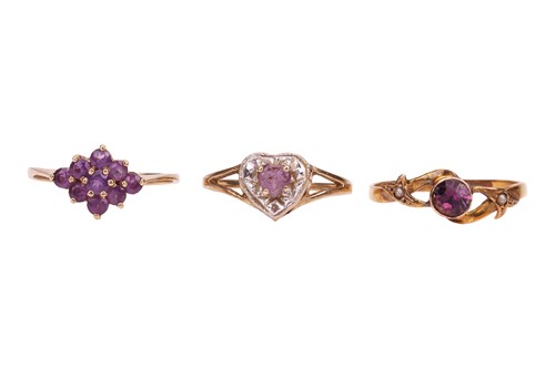 Lot 53 - Three gem-set dress rings including an...