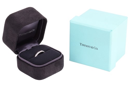 Lot 240 - Tiffany & Co. - A wedding band in platinum,...