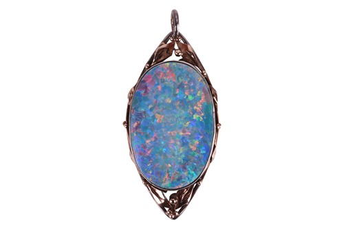 Lot An Arts and Crafts opal pendant, featuring a...