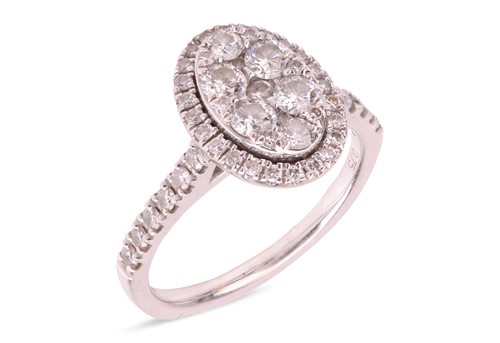 Lot A diamond-set cluster ring in 18ct white gold,...
