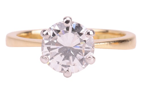 Lot A diamond solitaire ring in 18ct gold, the...