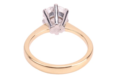 Lot A diamond solitaire ring in 18ct gold, the...