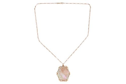 Lot 119 - A mother of pearl cameo on chain, the cameo of...