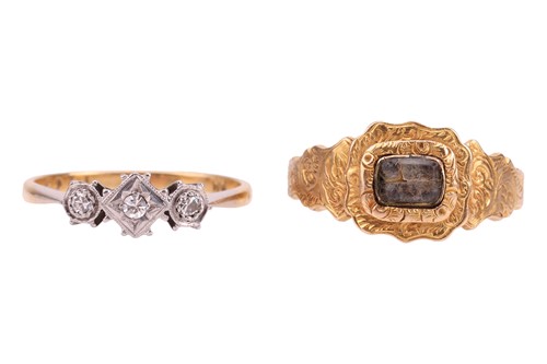 Lot 5 - A Victorian mourning ring and a three-stone...