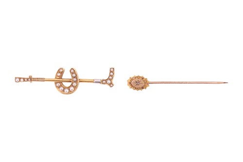 Lot 24 - A Victorian riding crop bar brooch and a stick...