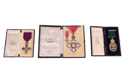 Lot 305 - A C.B.E. (civil) medal (cased) and miniature...