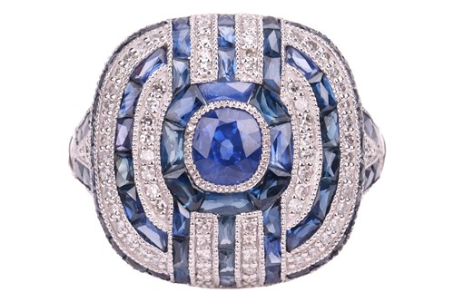Lot A panel ring set with sapphire and diamond,...