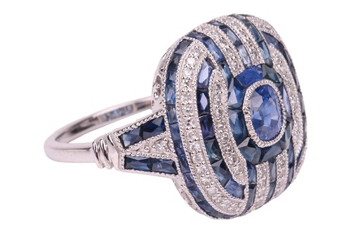 Lot A panel ring set with sapphire and diamond,...