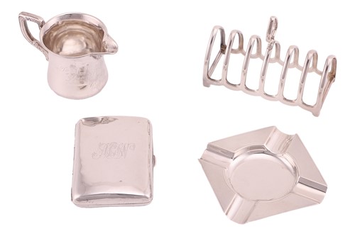 Lot 248 - A silver six-bar lancet shaped toast rack,...