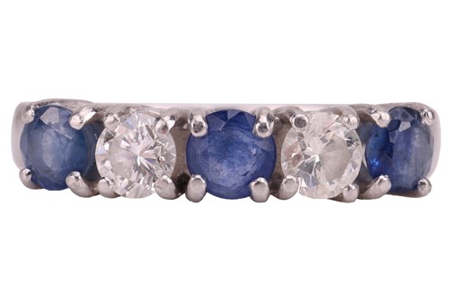 Lot 270 - A sapphire and diamond half eternity ring,...
