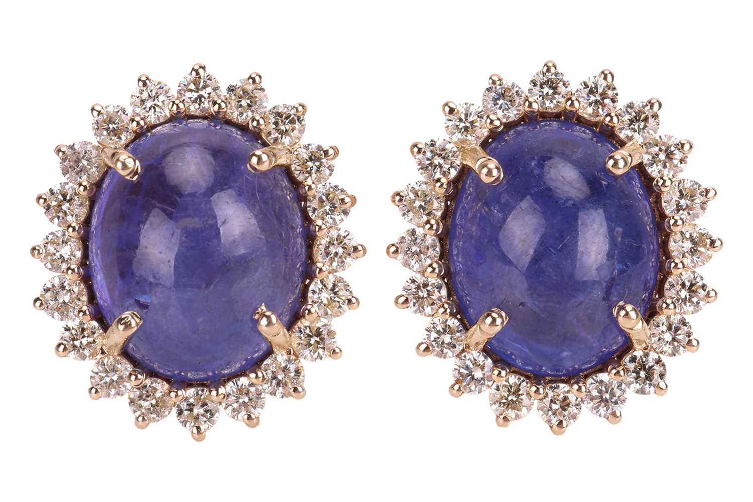 Lot A pair of tanzanite and diamond cluster...