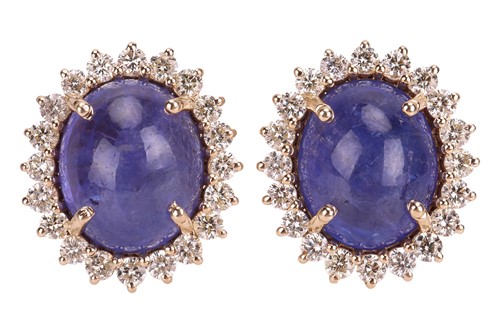 Lot A pair of tanzanite and diamond cluster...