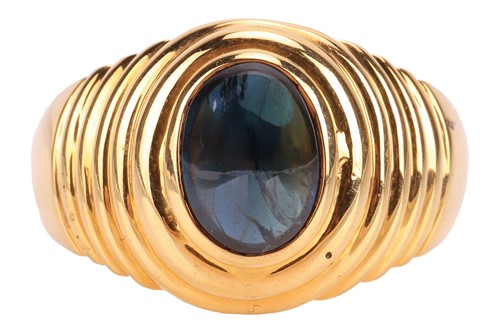 Lot A sapphire cabochon dress ring, comprising a...