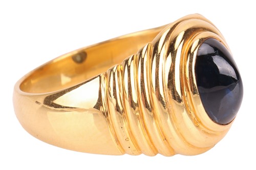 Lot A sapphire cabochon dress ring, comprising a...