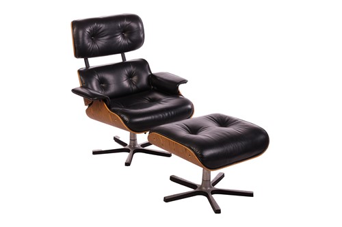 Lot 93 - A black leather upholstered swivel armchair...