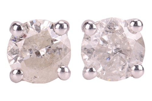 Lot 281 - A pair of diamond stud earrings, each...