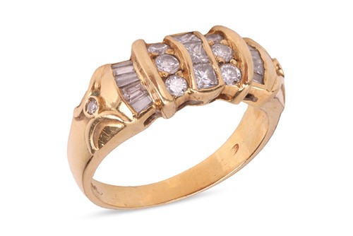 Lot 276 - A diamond set dress ring, featuring a central...