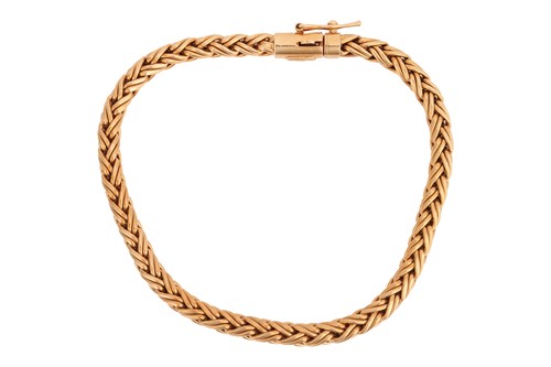 Lot 234 - Tiffany & Co. - A braided wheat link bracelet...
