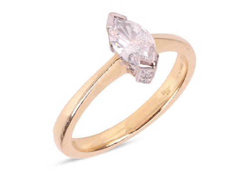 Lot 195 - A marquise-cut diamond solitaire ring in 18ct...
