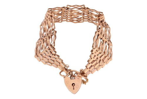 Lot 142 - A gate link bracelet in 9ct gold, comprising a...