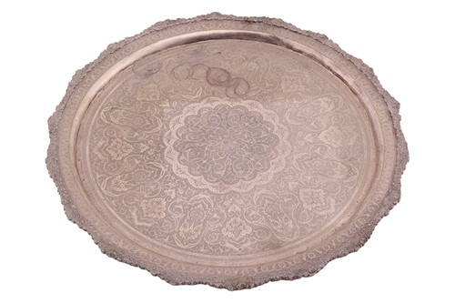 Lot 418 - A Persian white metal tray, of round form with...