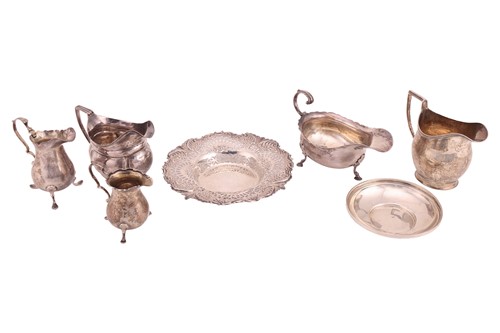 Lot 261 - A small collection of silver items, comprising...