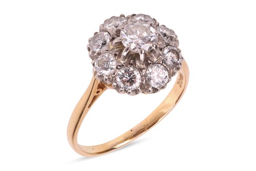 Lot 12 - A diamond floral cluster ring, claw-set...