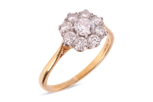 Lot 32 - A diamond cluster ring, of bi-coloured design,...