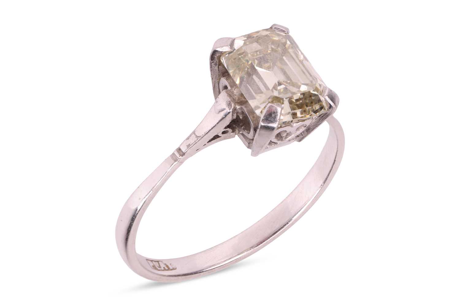 Lot A diamond single-stone ring, the four-claw set...