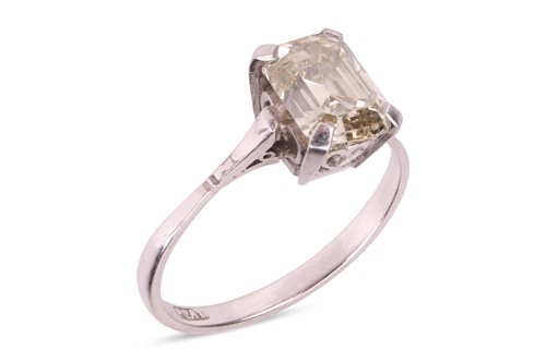 Lot A diamond single-stone ring, the four-claw set...