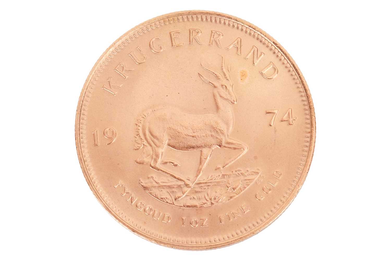 Lot 257 - A South African 1oz gold Krugerrand, dated 1974.